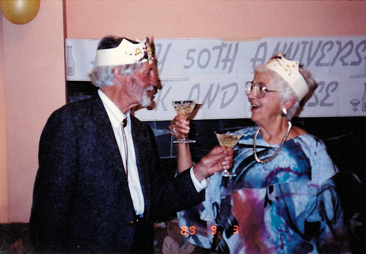 Kirk and Louise Kirkpatrick toasting each other on their 50th wedding anniversary, Sept. 3, 1989