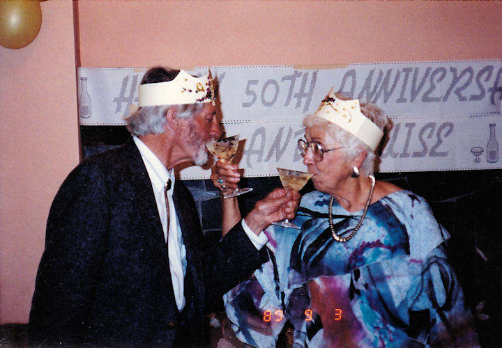 Kirk and Louise Kirkpatrick toasting each other on their 50th wedding anniversary, Sept. 3, 1989