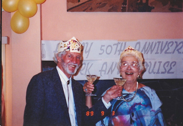 Kirk and Louise Kirkpatrick toasting each other on their 50th wedding anniversary, Sept. 3, 1989