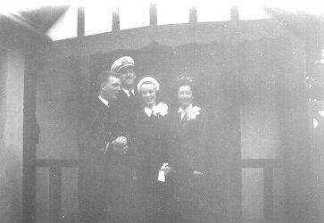 Ens. Dick Stimler, Lt. Comm. Kierstead, Diane Stimler (n&eacute;e Anderson), and Mrs. William Faulconer.