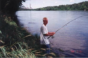 Adam Rodgers fishing, August 1, 1999.