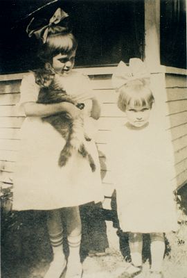 Alice Stickney with cat and her cousin Marilyn.