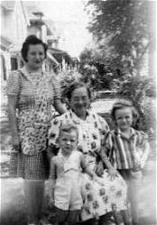 Ann Hall (n&eacute;e Stimler), Grandma, Joe and Judy Hall.