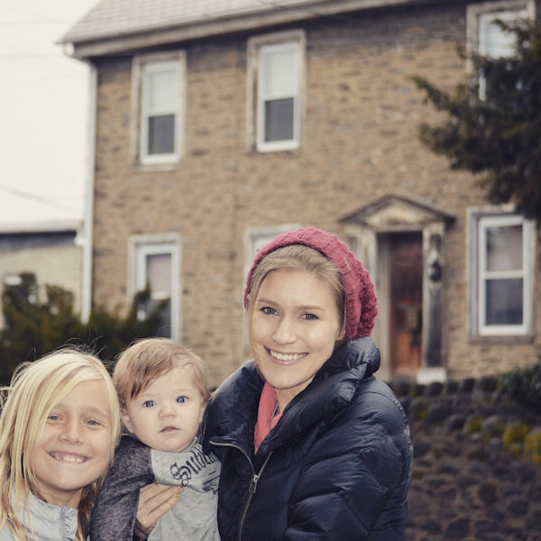 Tanya Bartek family in front of Stimmler ancestral stone house in Manayunk, PA