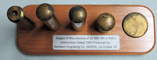 WWII shell casing display stand made of maple by Ralph Mullally