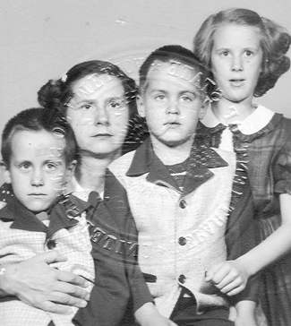 Passport photo of Helen Bordua and her children, Leon, Tom and Judi, January 1957.