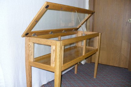 Wooden case for Roy J. Mullally's trumpet made by his son, Ralph Mullally, 2008