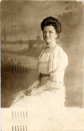 Front of postcard from Ernest Greenwood to Bertha Kampa, dated and postmarked May 13, 1912, showing photograph of Clara Greenwood (n&eacute;e Kampa).