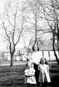 Deed holding Joe Hall, Helen Hamer and Judy Hall.