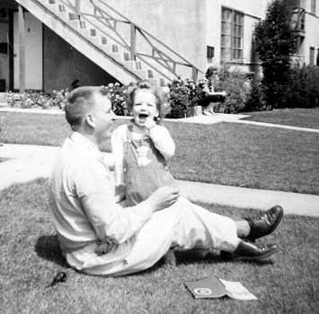 Richard Stimler with his daughter Rae in front of their home, La Mesa CA.