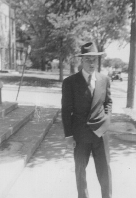 Dick Stimler in suit and hat