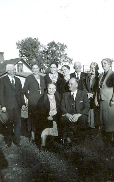 Grandma Bertha Stimmler Dingmann with her cousins.  Standing left to right:  George Benninghoff, Bertha Stimmler, Minn Knoll, Sophia Dingmann, Ed Dingmann, Mary Mc Donald, Anna Benninghoff