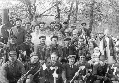 Townspeople gather to put up firewood, Autumn 1923, Claremont, MN.