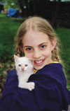 Hannah Kosloski and her white kitty