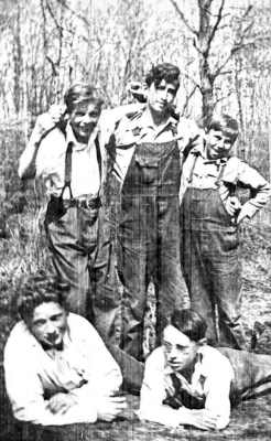 Sylvester Derksen, Harry Kampa and Vernon Kampa standing in back; Morris Derksen and Peter Kampa on ground in front.