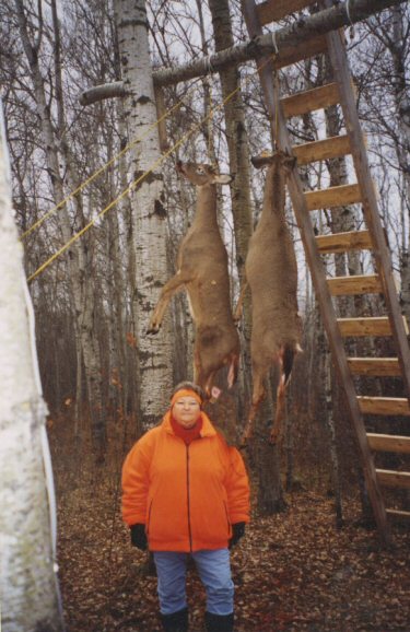 Helen Hengel, Nov. 2002 with two spike bucks