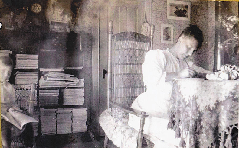 Jennie Qvale writing at table