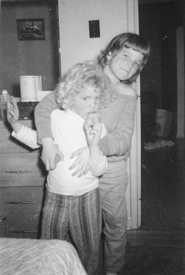Jody and Dana in their parents' bedroom, Vallejo, California