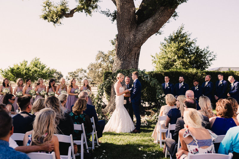 Katie and Griffin during the ceremony, Aug. 4, 2018