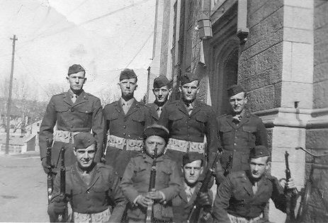 Leon C. Popilek at lower left, with other Marine troops.