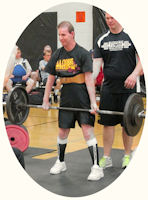 Greg Mullally at powerlifting event