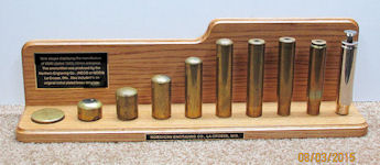 WWII shell casing display stand made of maple by Ralph Mullally