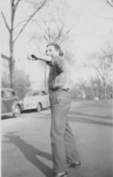Dick Stimler throwing a football, late 1940s