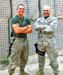 Cousins Lance Corporal Spencer Hegenbarth and Captain Roy Mokosso, Iraq, early 2009