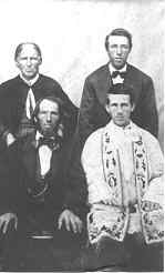 Daguerreotype of Johann, Lenaney, son Nicholas Stimmler and unidentified priest, circa 1856-1858.