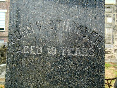 Gravestone left panel showing John V. Stimmler, aged 19 at time of death
