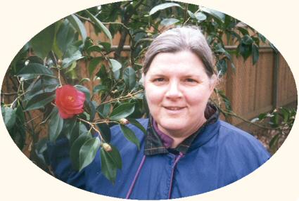 Marsha Sovoda in her rose garden, 2001.