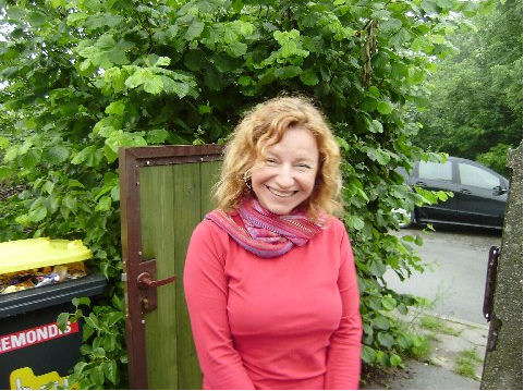 Nela in front of her office