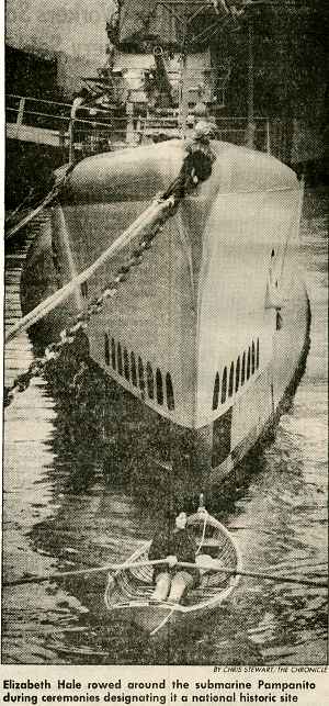 Elizabeth Hale rowed around the submarine Pampanito during ceremonies designating it a national historic site.
