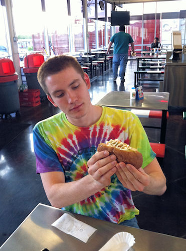Phil getting ready to bight into a Sonoran hot dog, a Tucson specialty