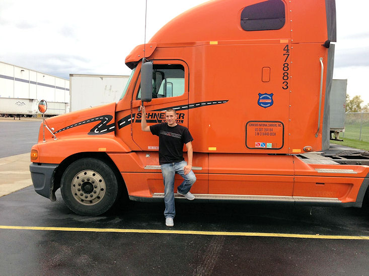 Phil Kampa beside the rig he drives for Schneider Transportation Co., Dec. 2012