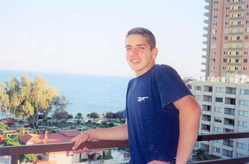 Ryan Butros on balcony of 'summer' home (7th floor), May 2001.