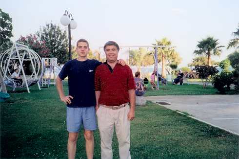 Ryan and Reha Butros on the grounds outside their home in Mersin, Turkey, May 2001.