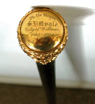Engraved head of walking stick presented to The Mayor, S. B. Qvale, City of Willmar, Minnesota, 1903-1904 from grateful citizens, photograph taken by Rae Bordua, 2004.