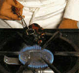 Fire-roasting red peppers for your pizza!