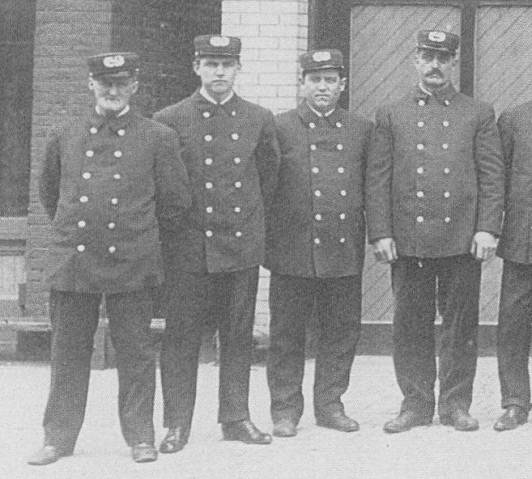 Closeup of St. Cloud Fire Department, showing Louis G. Balder [second from left] and William J. Balder [fourth from left].