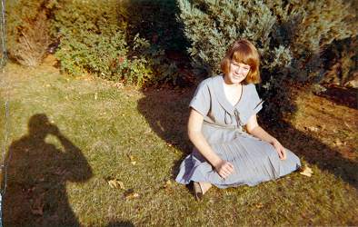 Rae Stimler wearing her Grandmother's dress and shoes, 3 weeks' shy of age 13.